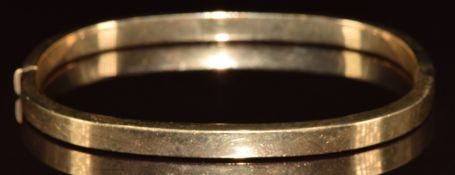 A 9ct gold bangle, 11.2g, 6.3 x 5.5cm