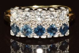 An 18ct gold ring set with a row of diamonds and row of sapphires, 3.5g, size N
