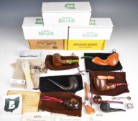 Seven American briar and treen smoking pipes including three Ohio Briarsm Merchant Service,