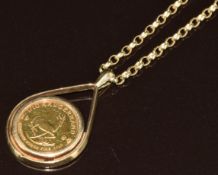 A 9ct gold pendant set with a 1984 1/10 gold krugerrand on 9ct gold chain, 11g, 44cm