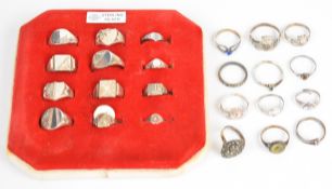 Fourteen silver signet rings and ten other silver rings including Connemara marble, marcasite, etc