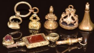 A 9ct gold dog clip (2.3g), Victorian watch key, three Victorian intaglio seals, etc