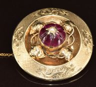 Victorian 9ct gold brooch set with a foiled garnet set with a split pearl with ivy decoration and an