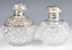 Two Victorian hallmarked silver mounted cut glass dressing table scent bottles, one Birmingham 1900,