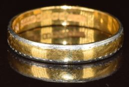 A 22ct gold wedding band/ ring with platinum borders, 3.2g, size Q