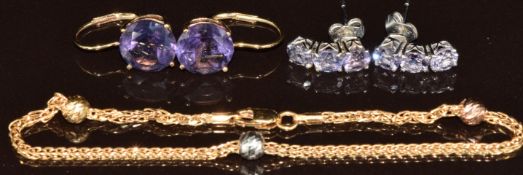 An 18ct gold bracelet with spherical beads (2.5g, 19cm) and two pairs of 9k gold earrings both set