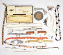 A collection of costume jewellery including carnelian agate necklace, glass beads, agate