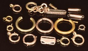 Eight c1900 9ct gold bolt clasps, some unmarked (3.8g), 9ct gold barrel clasp (0.4g) and other