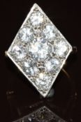 An 18ct rose gold ring set with white sapphires in a marquise platinum setting, 5.7g, size L