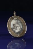 Georgian pendant set with a portrait miniature on ivory depicting a young woman weeping at an urn on
