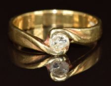 An 18ct gold ring set with a diamond (damaged), 3.8g, size N