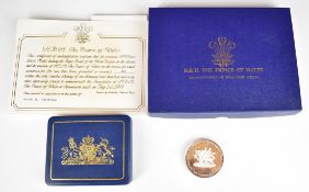 A cased silver HRH Prince of Wales Investiture silver commemorative coin medal, with certificate etc