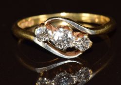 An 18ct gold ring set with three diamonds of approximately 0.2ct, 0.08ct and 0.08ct, 2.8g, size O