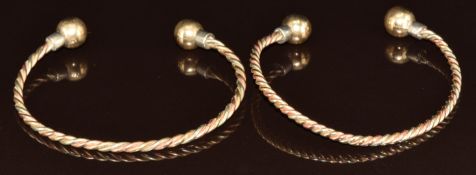 Two 9ct gold tri-coloured rope twist bangles, 29.8g