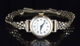 Rotary 9ct gold ladies wristwatch with blued hands and Arabic numerals, silver dial and signed 15