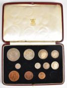 Cased part set of 1935 George V specimen coins, including rocking horse crown