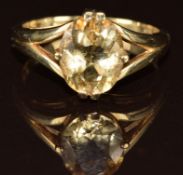 A 9ct gold ring set with an oval cut citrine, 3.8g, size P