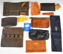 Seven leather / canvas or faux leather pipe or rolling tobacco pouches including Peterson leather