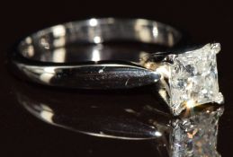 A platinum ring set with a princess cut diamond of approximately 1ct, 4.7g, size K