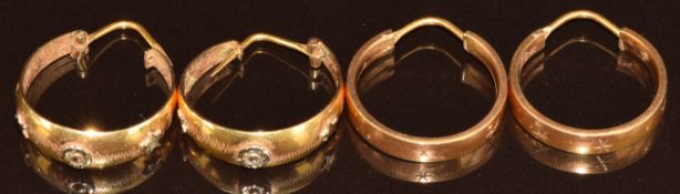 Two pairs of yellow metal hoop earrings (test as 14ct gold), 6.5g