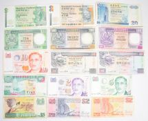 Fifteen Singapore and Hong Kong 1976-1999 banknotes consisting of Hong Kong HSBC, Standard Chartered