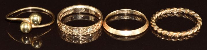 Four 9ct gold rings, 5.7g, sizes J & L