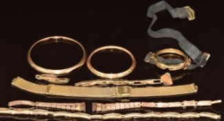 Three 9ct gold watch straps, two 9ct gold watch surrounds, etc, 23g