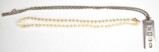A silver ingot on silver chain (40g) and a single strand of cultured pearls with 9ct gold clasp (