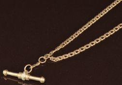 A 9ct gold chain with T bar pendant set with diamonds, 7.5g, 45cm