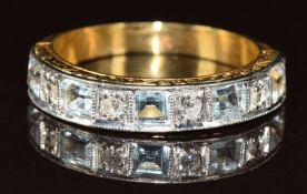 A c1930 18ct gold ring set with rectangular cut aquamarines and diamonds, 4.8g, size O