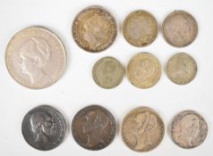 Eleven Netherlands silver coins including an 1830 Willem I half Gulden, 1845 and 1848 Willem II