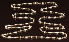 A 9ct gold necklace set with freshwater pearls by Ingebor Bratman, with receipt, 11.7g, 98cm