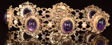 A 9ct gold bracelet set with pearls and amethyst cabochons, 21.7g, 18cm