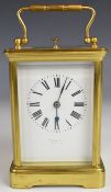 Repeating brass and bevelled glass carriage clock striking on a gong, indistinctly marked with