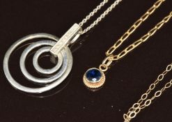 A 9ct white gold pendant set with diamonds on chain, 9ct gold pendant set with a sapphire and two