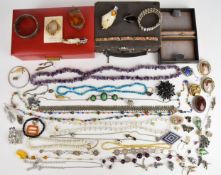 A collection of jewellery including silver signet ring, brooches including white metal set with