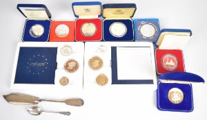 Cased silver proof coins comprising 1978 Guernsey Royal Visit 25p, 1977 Brunei $10, 1980 Tala