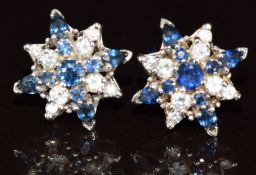 A pair of 18k white gold earrings each set with a cluster of diamonds and sapphires, 3.8g