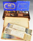 Two early 20thC filled mahogany artist's paint boxes by G Rowney 'Artist's Colourmen' and Winsor &