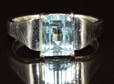 A 9ct white gold ring set with an emerald cut aquamarine of approximately 1ct, 4.1g, size O