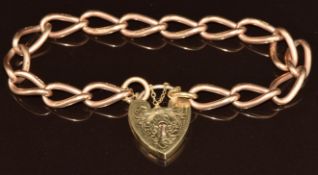 A 9ct rose gold bracelet made up of oval twisted links with more modern heart padlock clasp, 18.