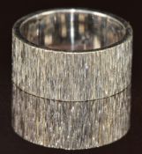 An 18ct white gold ring with textured finish, 5.7g, size H