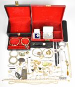 A collection of costume jewellery including tribal bangles, vintage earrings, watches, brooches, etc