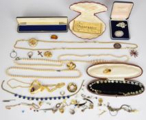 A collection of jewellery including large abstract pendant set with an amethyst, pair of silver