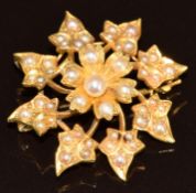 Edwardian 15ct gold pendant/ brooch set with a natural pearl surrounded by split pearls, 5.1g, 2.