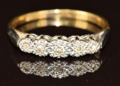 An 18ct gold ring set with five diamonds in a platinum setting, 3.1g, size P