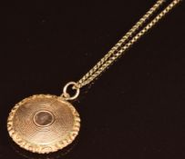 Victorian 9ct gold locket with engine turned decoration, on 9ct gold chain, 6g, 56cm, 2.5cm