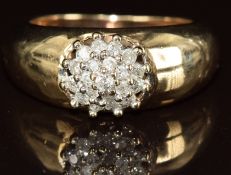 A 9ct gold ring set with a cluster of diamonds, 4.8g, size N