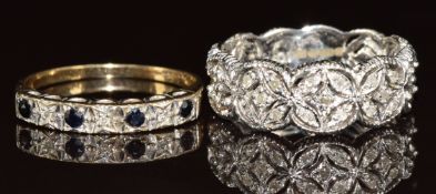 A 9ct white gold pierced ring set with diamonds and a 9ct gold ring set with sapphires and diamonds,