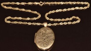 A 9ct gold locket engraved with floral and scrolling decoration (3.1 x 2.2cm) on 9ct gold chain,